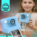 Cyfrowy aparat natychmiastowy dla dzieci z drukarką Drukuś + 11 rolek i karta SD 32 GB
